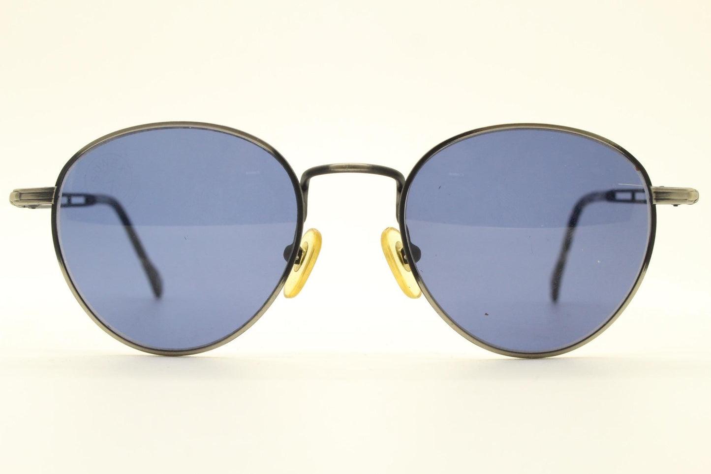 90s vintage metal oval sunglasses. Minimal brushed bronze finish brown frame with grey lenses and detailed arms. Steampunk. Panto. NOS