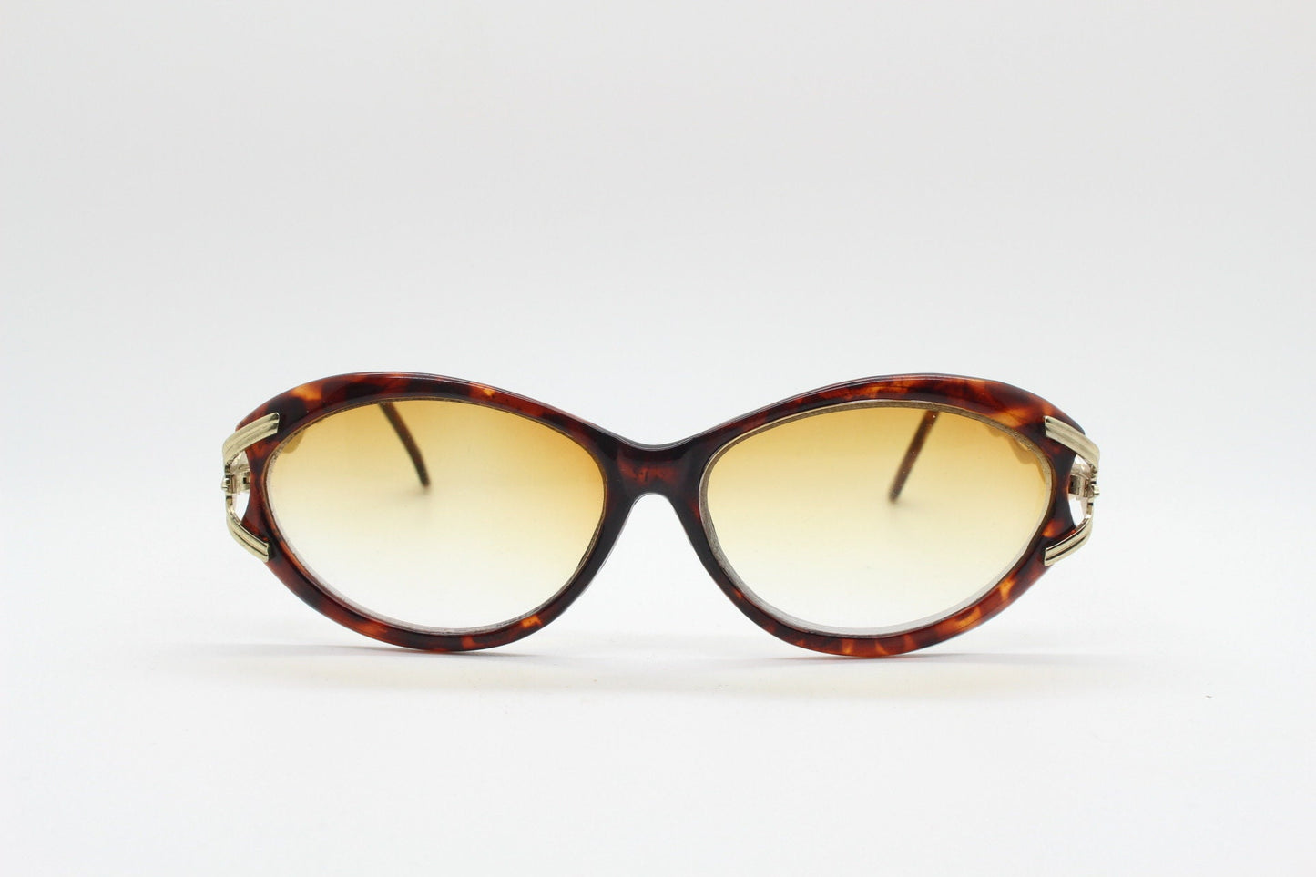 90s vintage oval cateye sunglasses. Womens honey tortoise frame with dynamic metal chain link arms and extra light tone lenses. Unused NOS