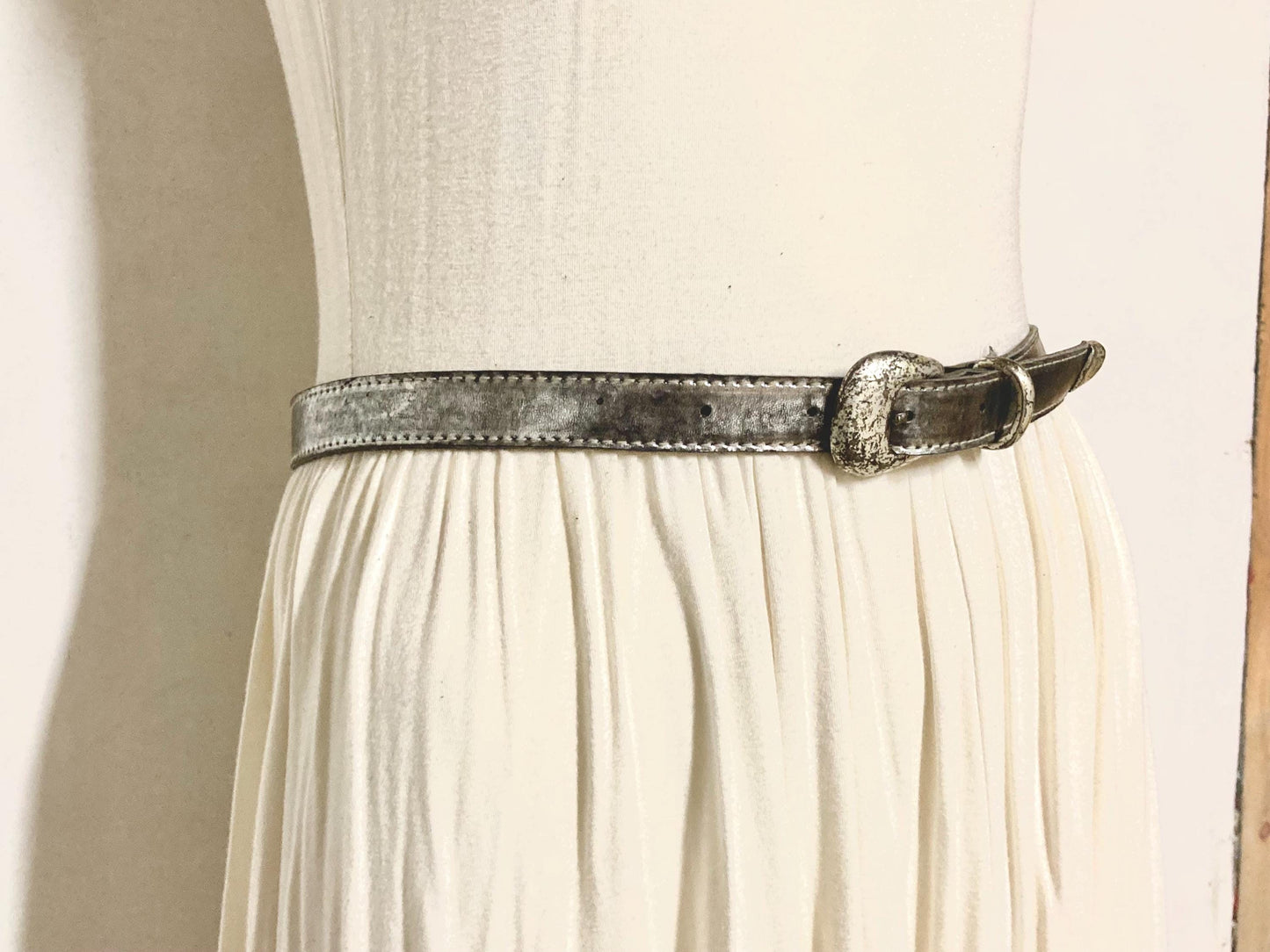 90s vintage womens dress or jeans / trousers belt in distressed worn metal looking finish. Vinyl on leather construction. Made in France