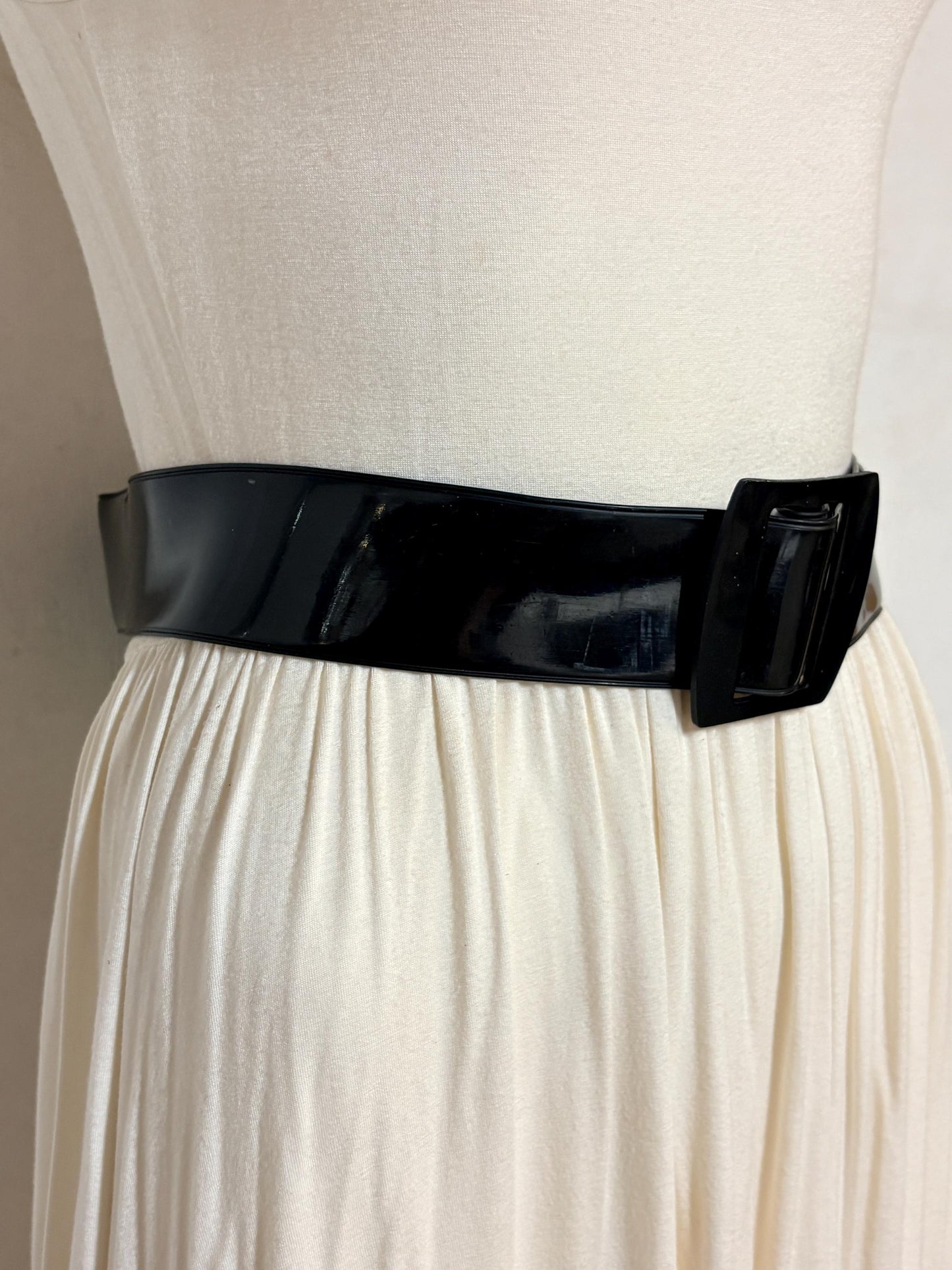 80s vintage womens shiny fetish 2" dress belt. All black seamless vinyl with well matched flat buckle. 50s kinky pin up bad girl