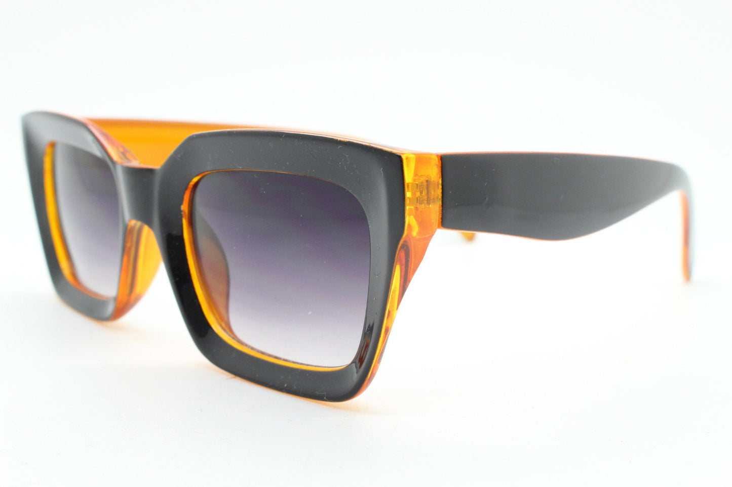 Y2K vintage rectangular cat eye sunglasses. Women's thick black and orange 60s style frame with graduating smoky lenses. 2000s BNWT