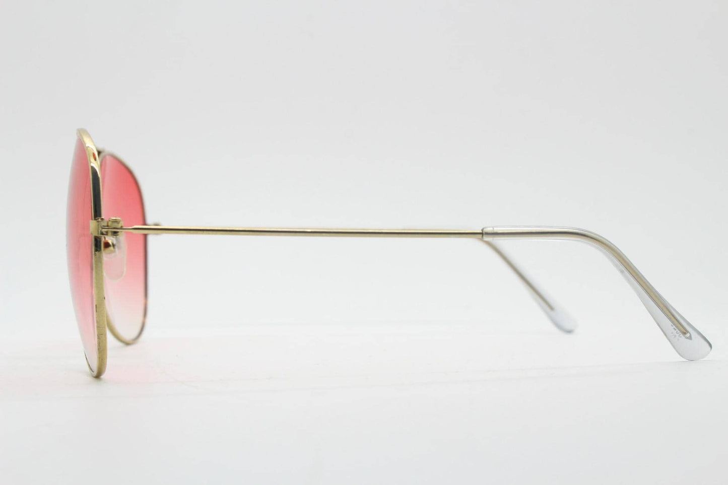 Y2K vintage aviator sunglasses. Gold metal frame pilot aviators with atmospheric light pink gradient lenses. Teardrop. 70s. 2000s. 00s NOS