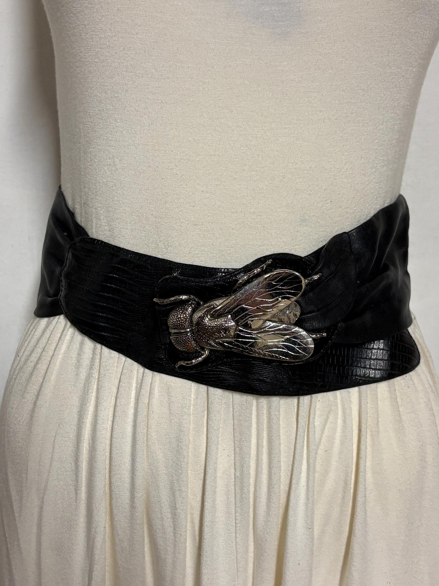 80s vintage womens black real leather dress belt with substantial dramatic big fly metal buckle. Womens sash. Statement feature belt
