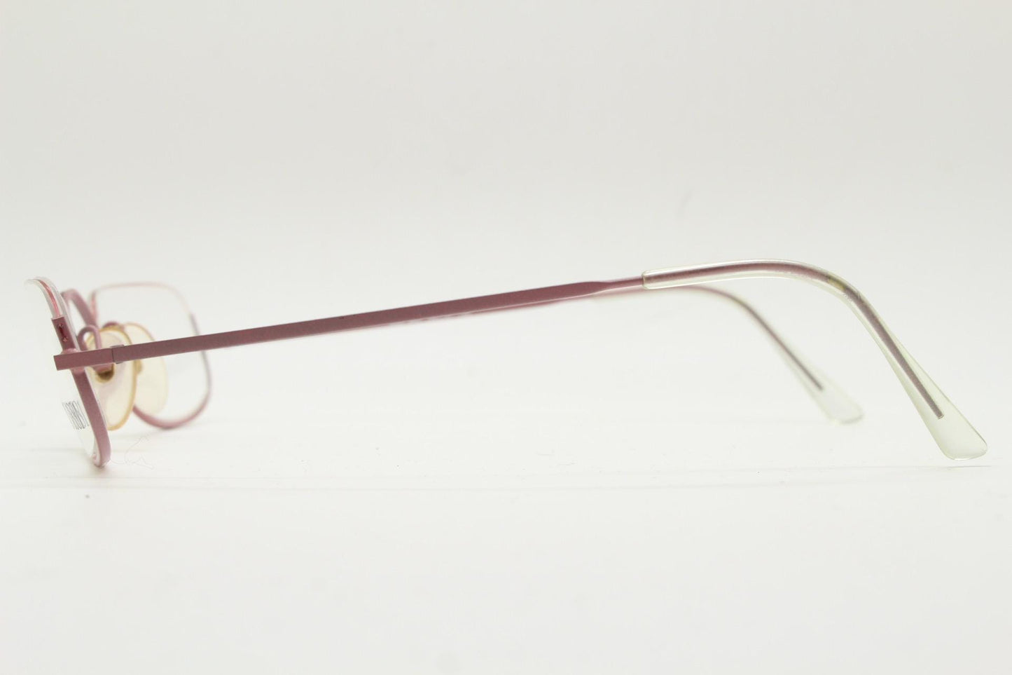Cerruti 1881 half moon eye glasses. Pink half frame optical eyeglasses. Undulating C bridge design. 90s vintage prescription spectacles. NOS