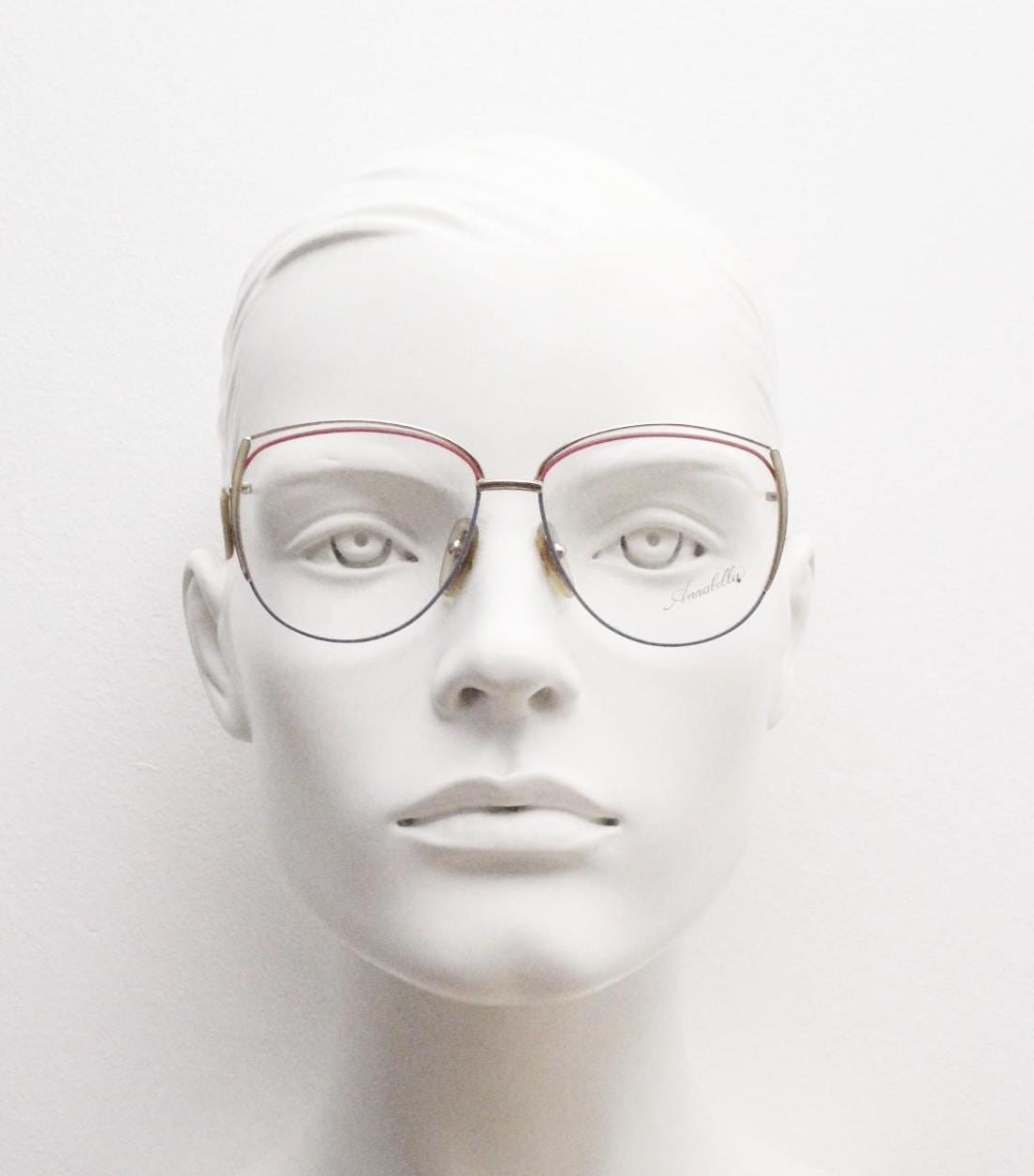 80s vintage gold metal eye glasses made in Italy by Annabella. Inventive double brow with pink highlights. Optical frame. Prescription NOS