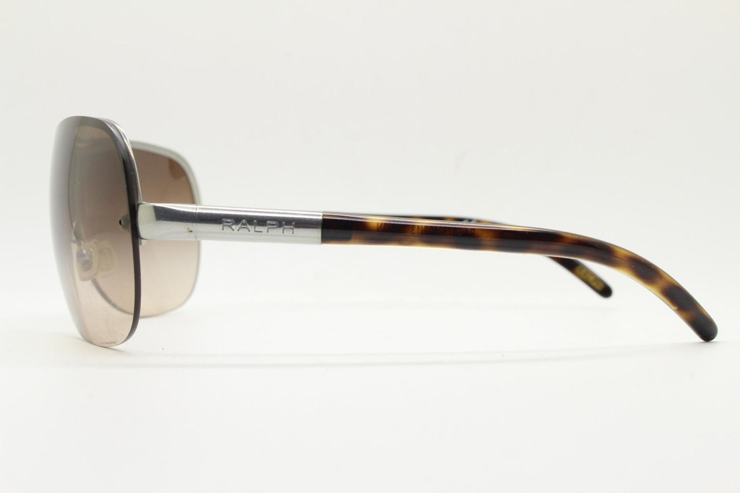 Ralph by Ralph Lauren Y2K vintage big shield sunglasses. 2000's curved wraparound mini mask with graduating mono lens. Aviator