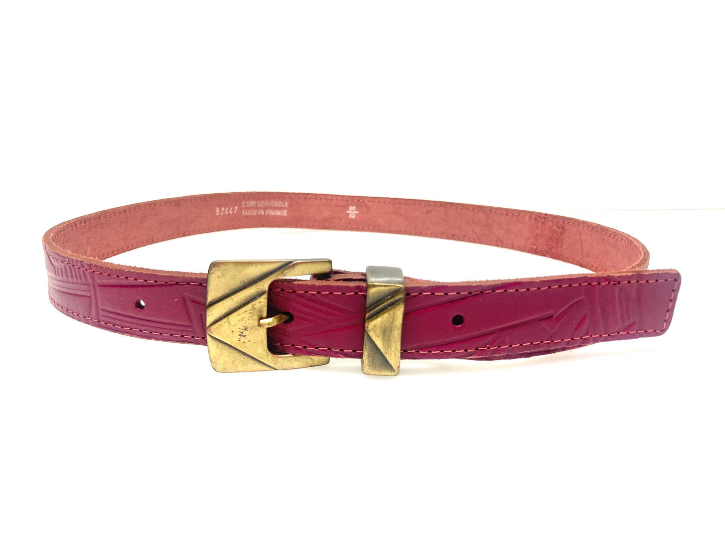 80s vintage womens pink genuine leather 1" belt Made in France. Abstract embossed pattern with brass buckle. For jeans or dress. VGC. NOS