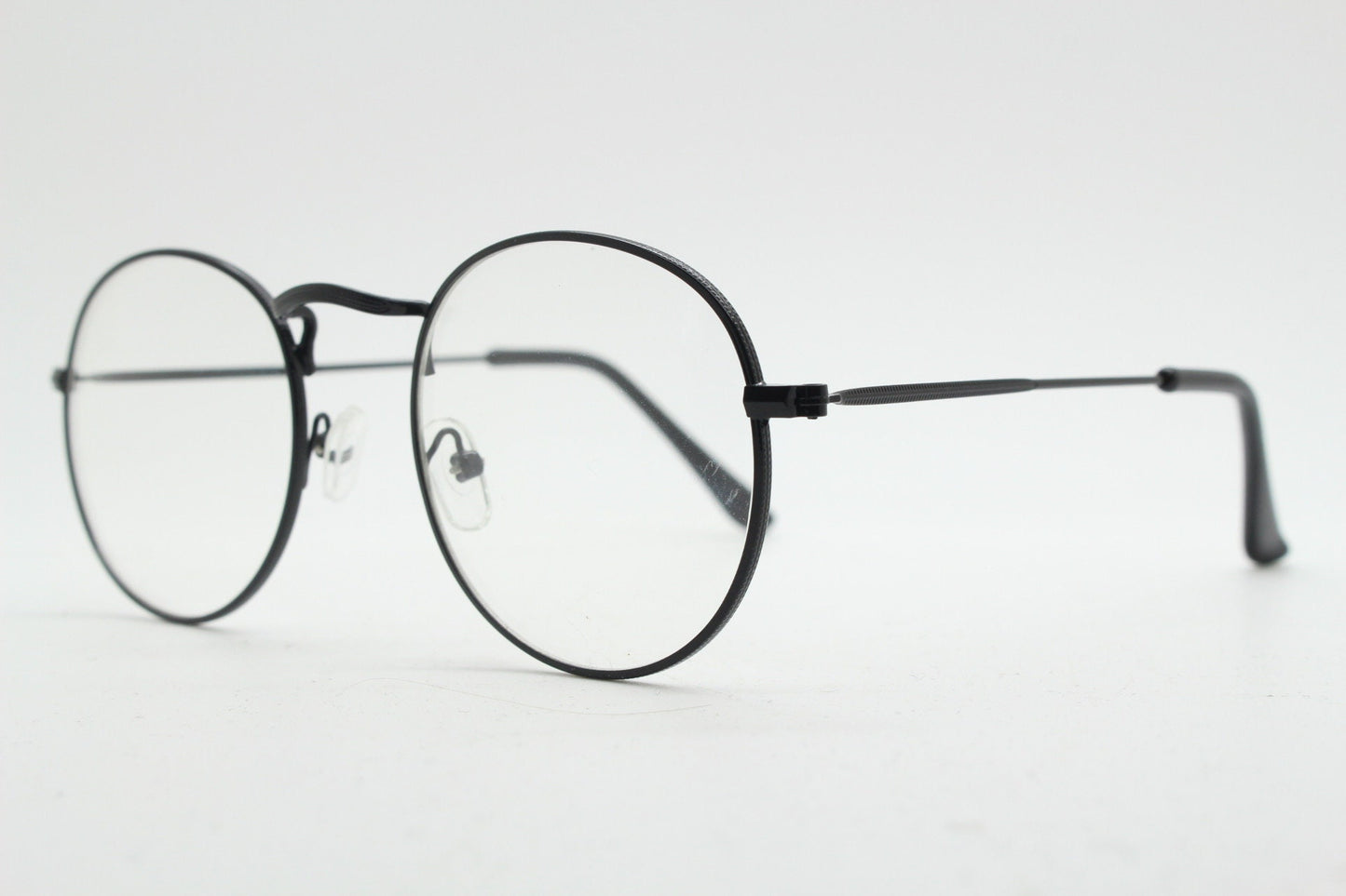 90s vintage round metal glasses. Classic 60s panto design black frame with clear lenses in excellent proportions. Unused NOS eyeglasses