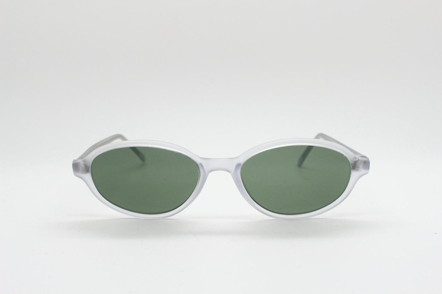 Vintage 90s futuristic oval sunglasses. Frosted transparent frame cat eye with dark green lenses. Unused NOS