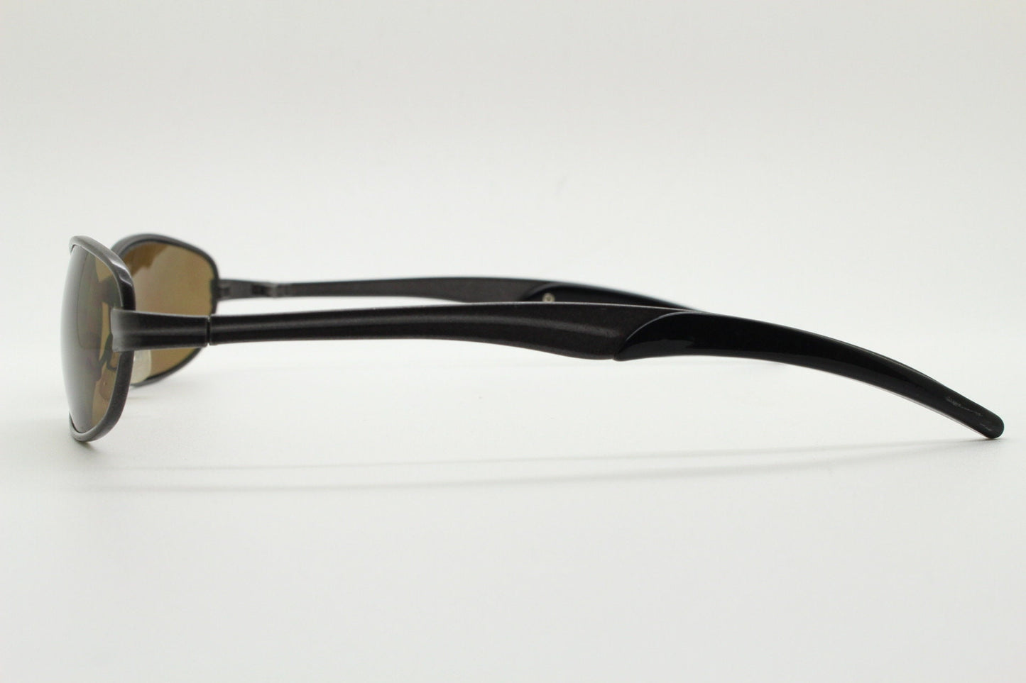 90s vintage oval small bug eye sunglasses. Curved brown satin finish solid metal frame with spear point rubber ends. Steampunk. Quality NOS