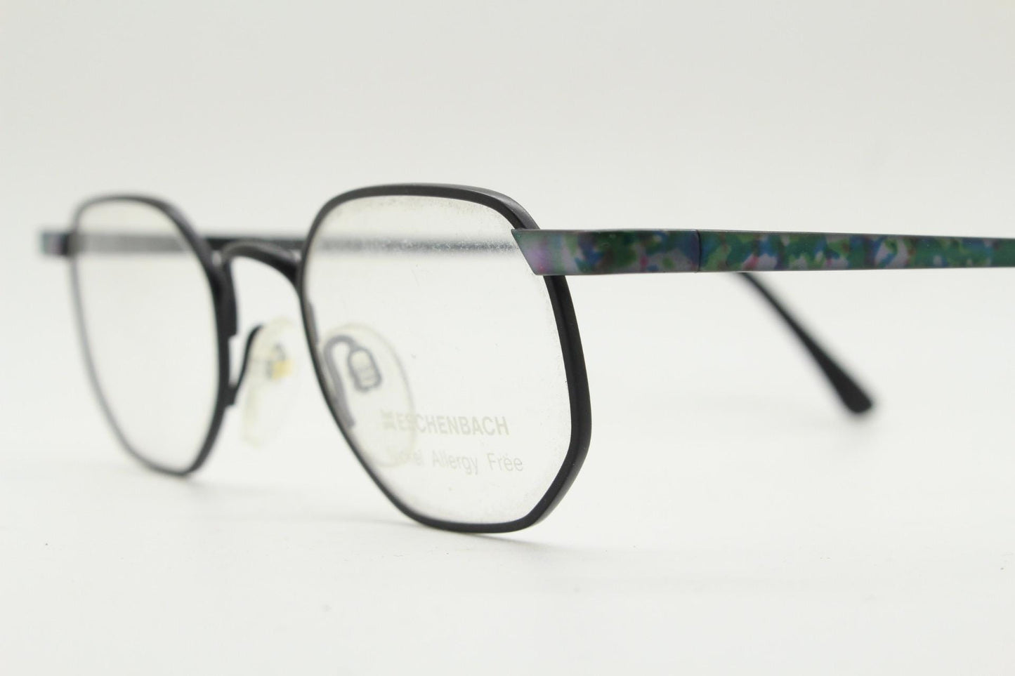 Eschenbach 90s vintage angular octagon eye glasses. Sharp matt black optical frame with blue marbled arms. Prescription RX spectacles. NOS