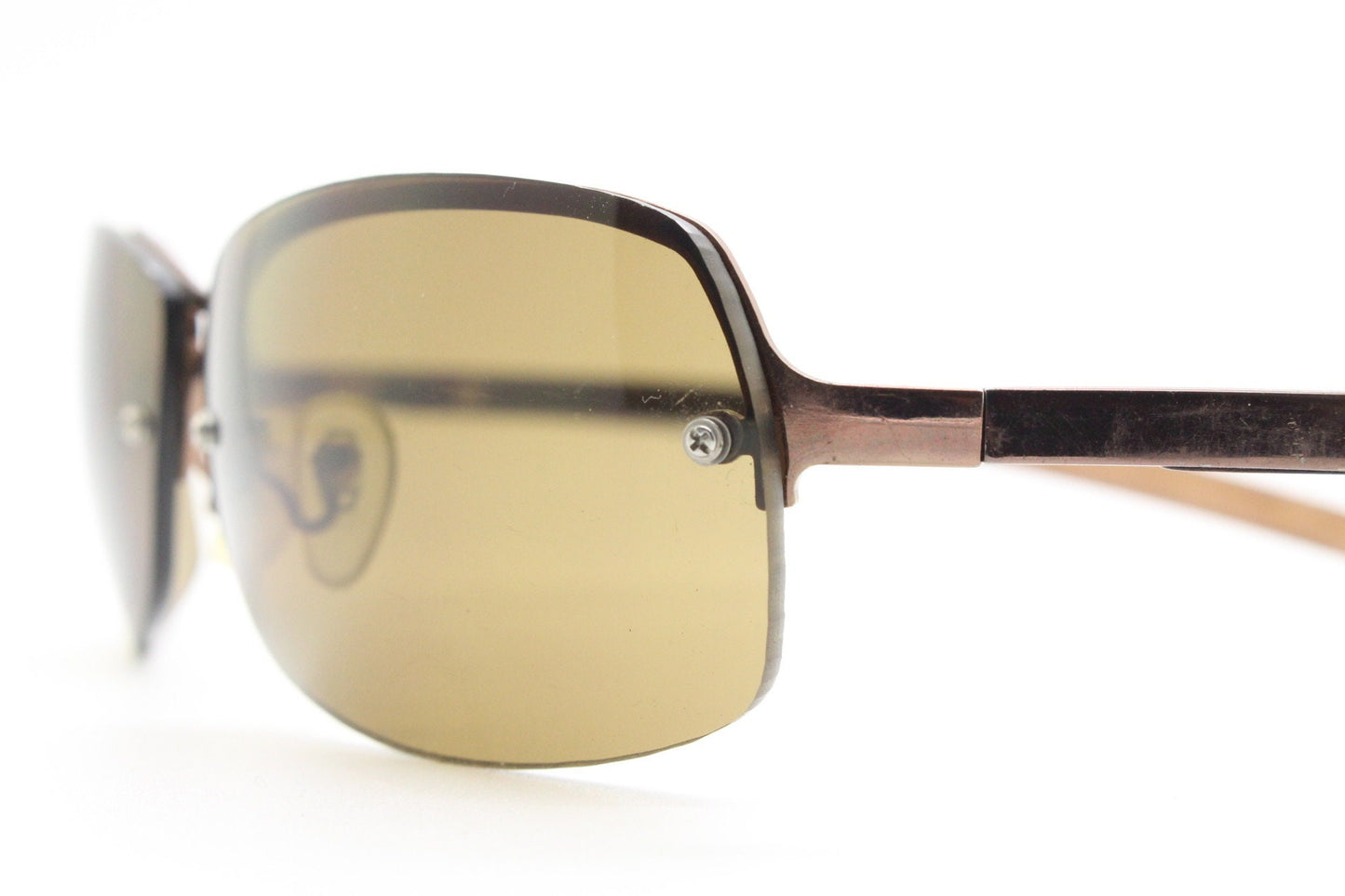 Y2K vintage modified small aviator sunglasses. Metallic brown chrome half frame with curved bug eye lenses and straight arms. 2000's. NOS