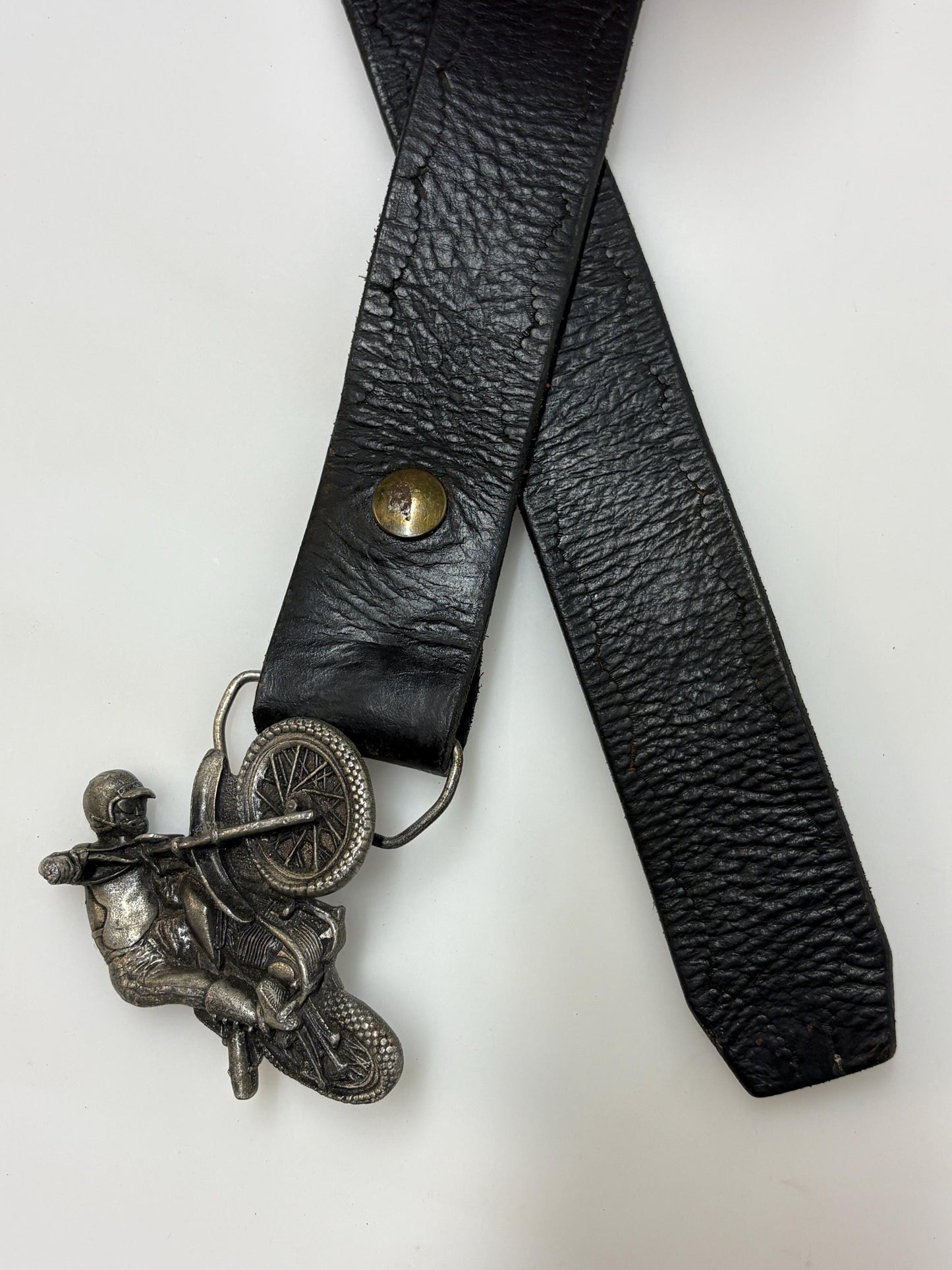 70s vintage Bergamot brass works 3D motorbike rider buckle on black genuine leather textured and embossed changeable belt. Moto X scrambler