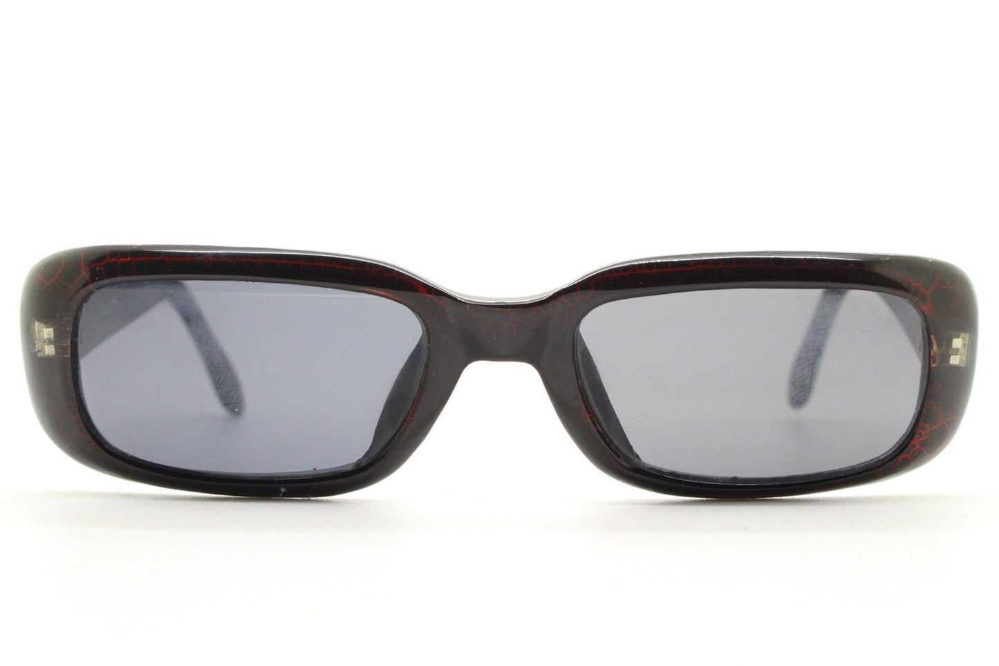 90s authentic vintage abstract rectangular sunglasses. Thickened black frame with red crackle print. NOS