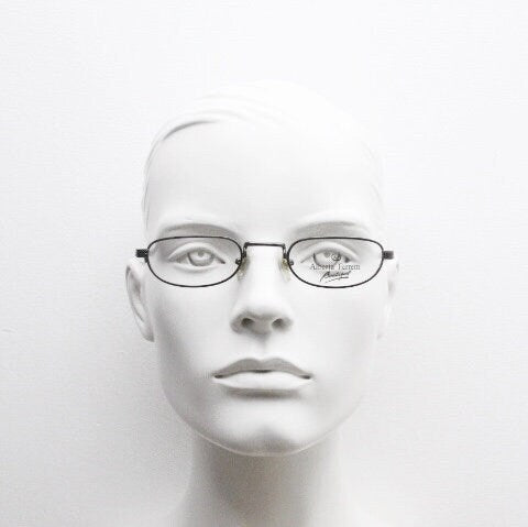 Alberta Ferretti 90s vintage oval eye glasses made in Italy. Small grey metal optical frame with ornate arm pattern. Prescription RX. NOS