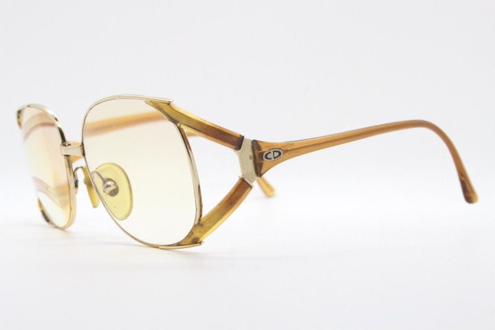 Christian Dior 70s vintage round eyeglasses model 2524 made in Germany from Optyl. Transparent brown optical frame. Prescription eyeglasses