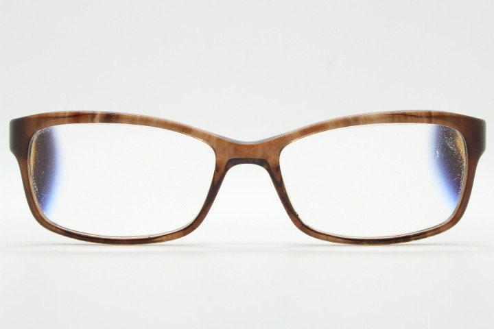 Calvin Klein collection rectangular cat eye glasses model 7851. Tortoise gloss acetate optical frames. Prescription eyeglasses. RX