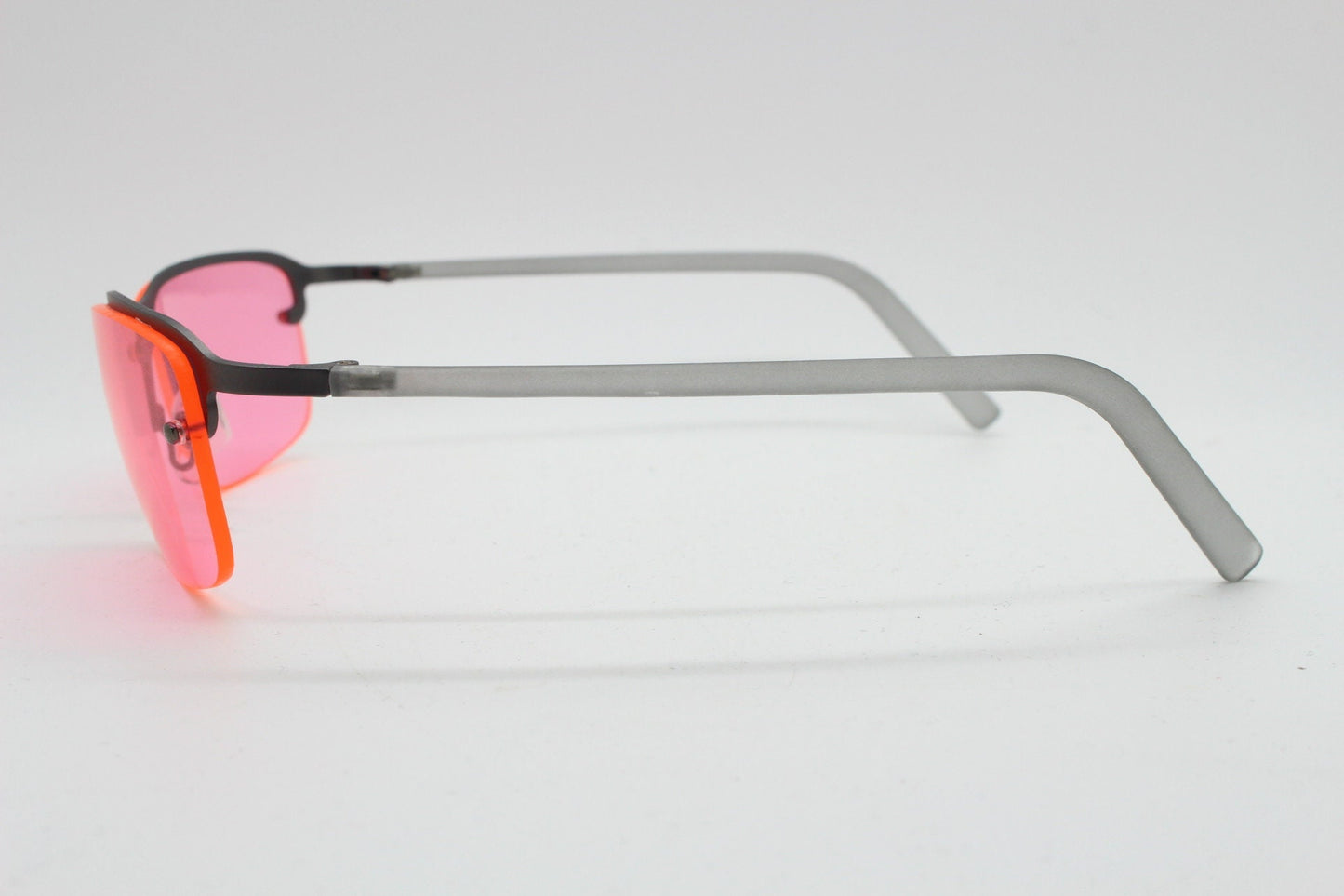 Y2K vintage half frame visor sunglasses. Semi rimless 2000's vivd pink lens on a gunmetal brow with frosted arms. Unused 00's NOS