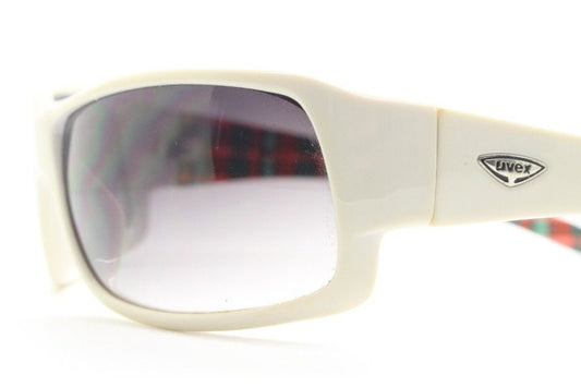 Uvex Y2k vintage wrap around bug eye sunglasses. Curving white sports shield frame with black lenses and tartan interior. Rave 2000s. NOS