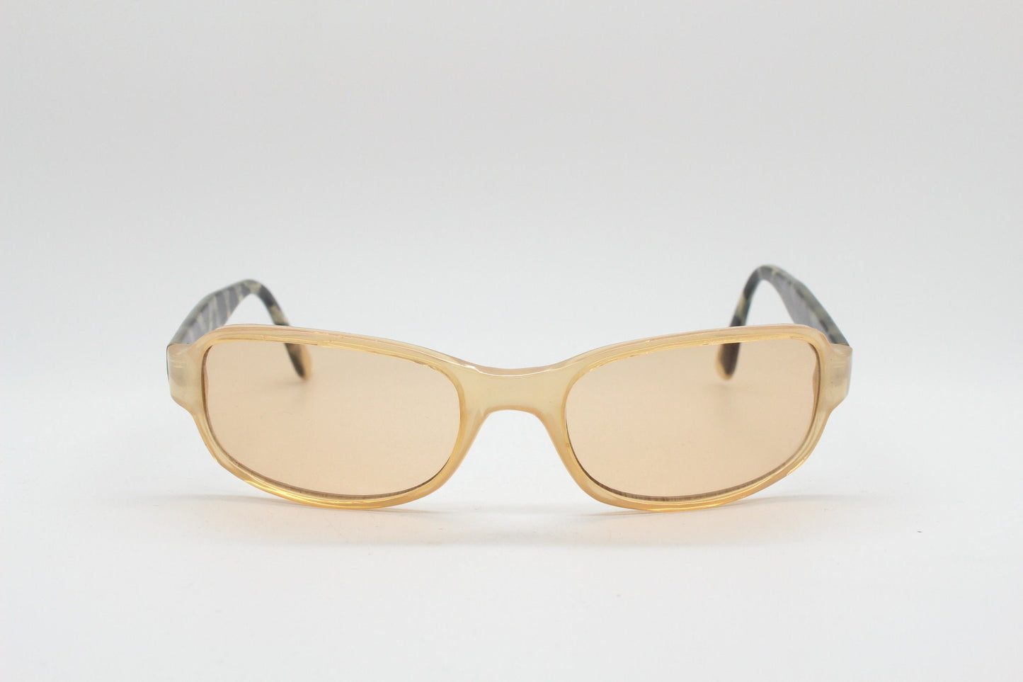 Y2K vintage curved rectangular sunglasses. Beige frame with matching lenses and contrasting tortoise arms. 2000s unused NOS. 00s