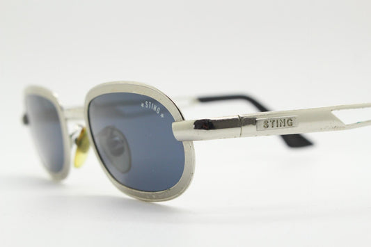 Sting 90s vintage oval sunglasses. Minimal 'Industrial tech' style in slightly small proportions that's quirky but in a quality finish