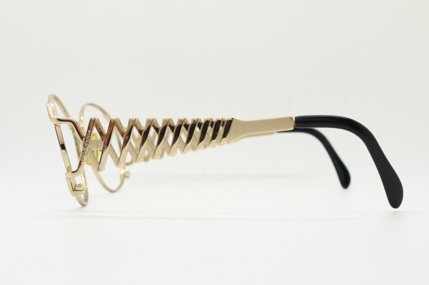 Yves Saint laurent 90s vintage large oval eye glasses made in Italy with incredible zig zag arm design. YSL Prescription RX spectacles