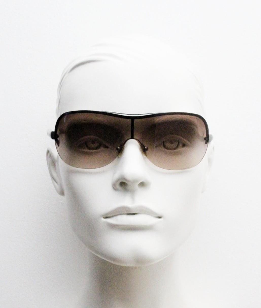 Ralph by Ralph Lauren Y2K vintage big shield sunglasses. 2000's curved wraparound mini mask with graduating mono lens. Aviator