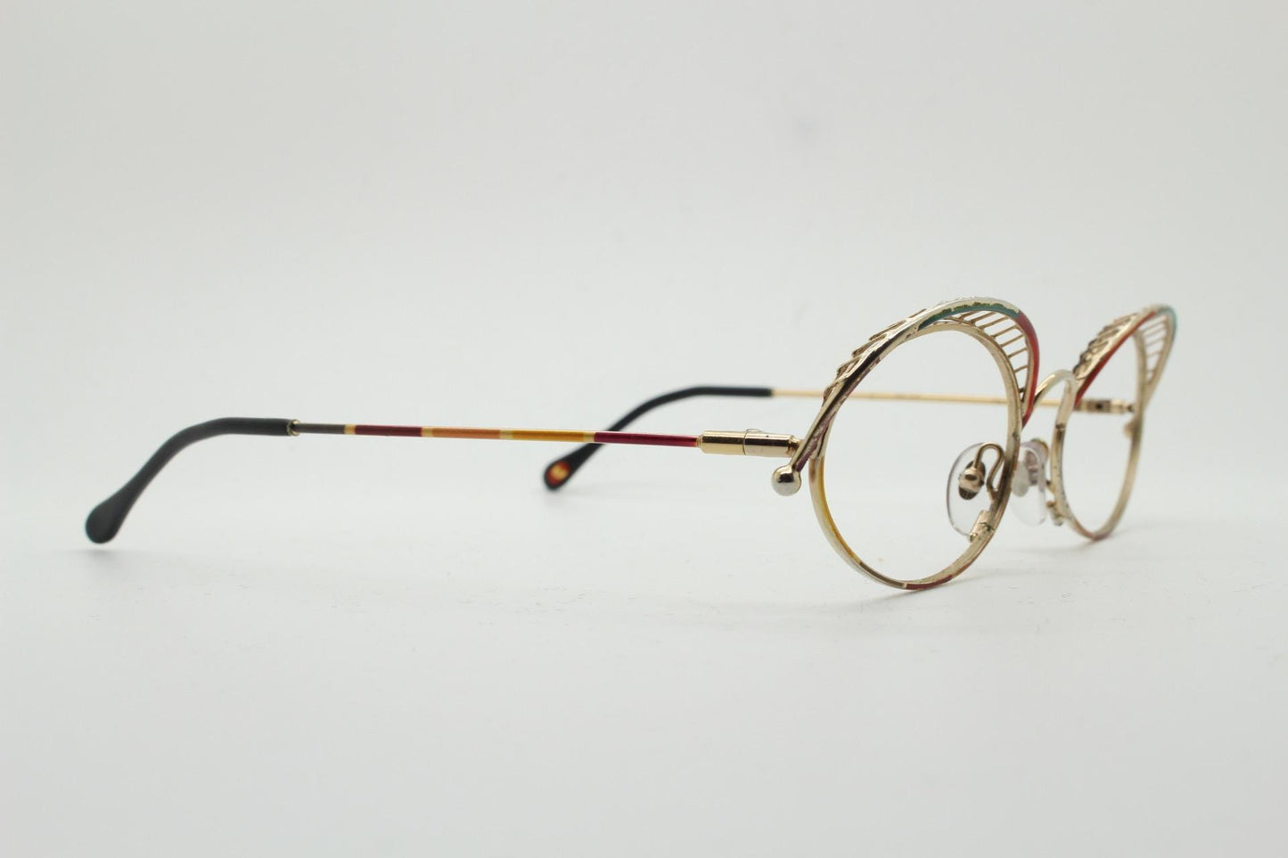 Casanova 80s vintage oval eye glasses. Incredible eyebrow canopy design with multi coloured finish. Optical frames. Prescription spectacles