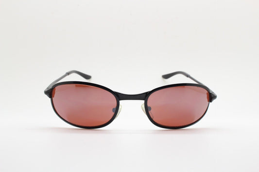 90s vintage curved oval sunglasses. Solid metal small bug eye frame in black satin finish with coral brown lenses. Quality NOS