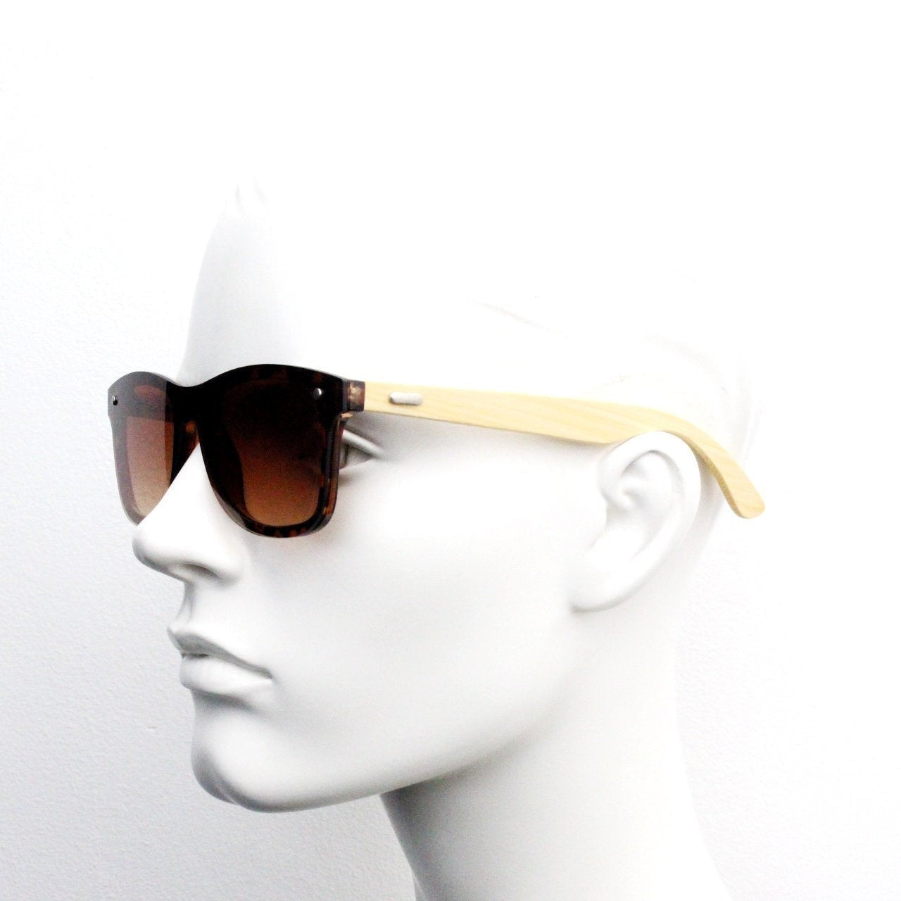 Vintage Y2K modified wayfarer style hand made sunglasses. Tortoise flat front monolens design with real wooden arms. Unused NOS