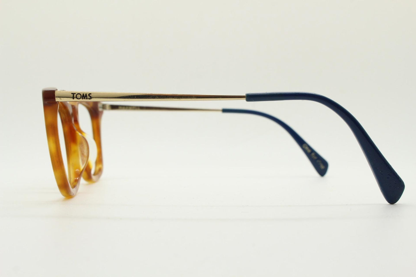 Tom's rectangular horn rim eye glasses. Classical 40s design in amber acetate with gold arms. Prescription optical frames. RX spectacles