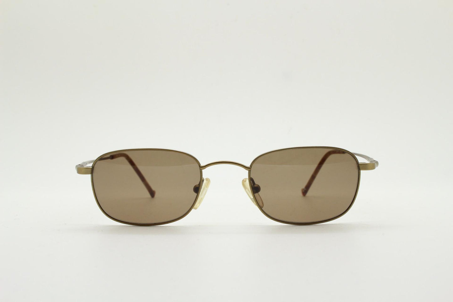 90s vintage small rectangular low profile metal sunglasses. Minimal slim frame in satin bronze finish with plain brown lenses. NOS. BNWT