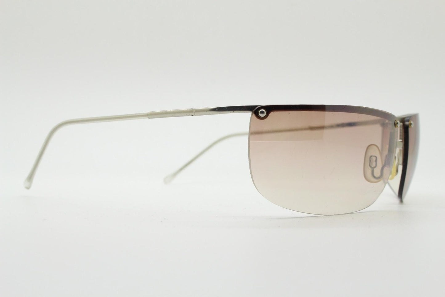 Y2K vintage visor sunglasses. Flat top half frame wraparound shield design with light tone graduating curved lenses. 2000's. NOS