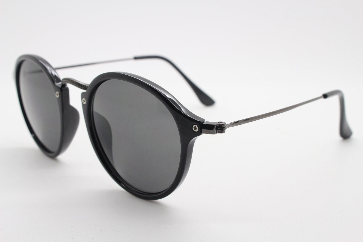 90s vintage round sunglasses. Black gloss slim 30s 40s design frame with metal bridge and dark lenses. Unused NOS