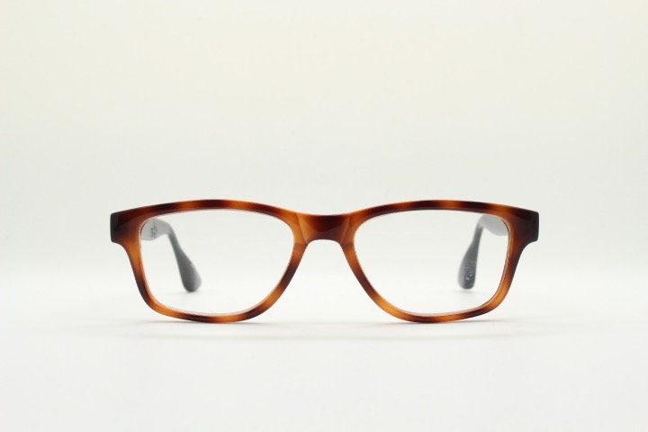 Isaac Mizrahi vintage rectangular eye glasses. Tortoise optical frames with contrasting black arms. Prescription RX. NOS spectacles