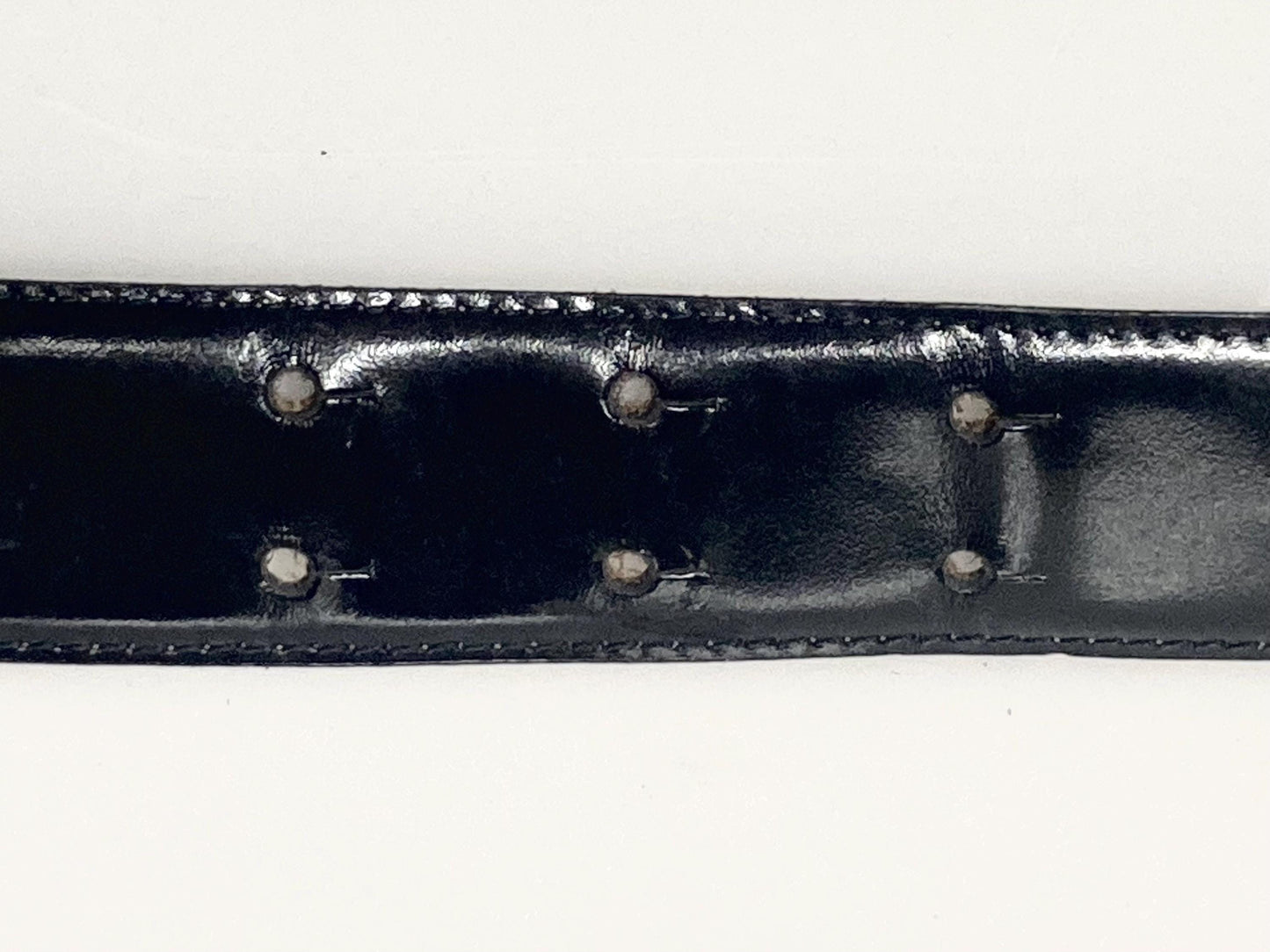 Moschino 90s vintage womens dress belt in black genuine leather. Iconic individual golden moving letters logo. Made in Italy. 80s. NOS
