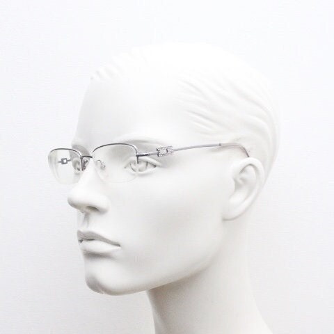 Gucci rectangular eye glasses made in Italy. Slim metal wire low profile optical half frame with diamante logo. Prescription eyeglasses. RX