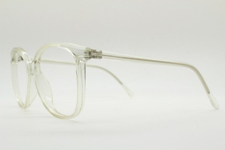 80s vintage oversized round cat eye glasses. Transparent clear crystal optical frame. Prescription RX spectacles. Clean NOS cateye