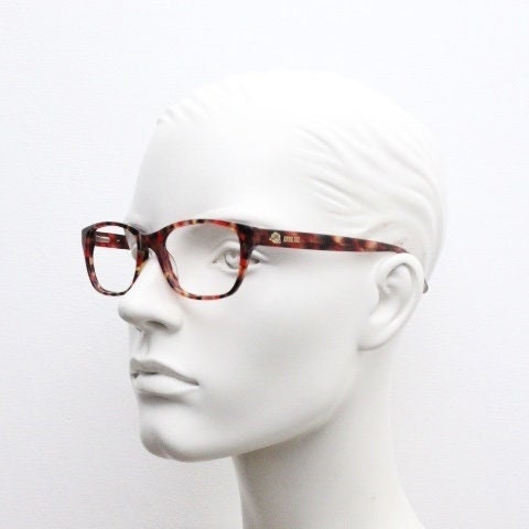 Anna Sui modified wayfarer design eye glasses. Superb marbled acetate optical frames with red tones. Prescription RX vintage eyeglasses