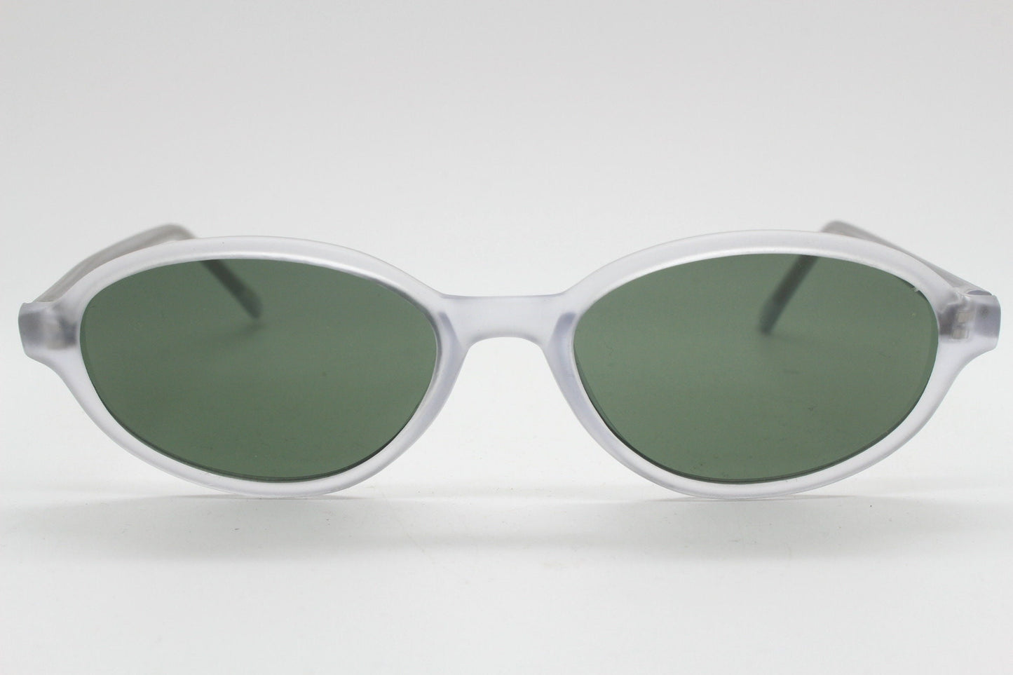 Vintage 90s futuristic oval sunglasses. Frosted transparent frame cat eye with dark green lenses. Unused NOS