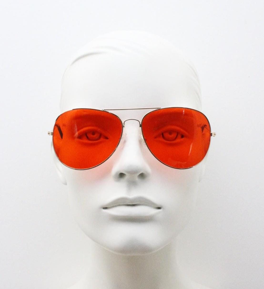 Y2K vintage teardrop aviator sunglasses. Gold chrome metal frame 70s design aviators with intense red lenses. 2000s. Unused NOS