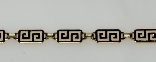 Y2k vintage womens decorative chain belt. Shiny gold chrome steel in a classical pattern with hanging end. Festival. Hippy. 2000s NOS