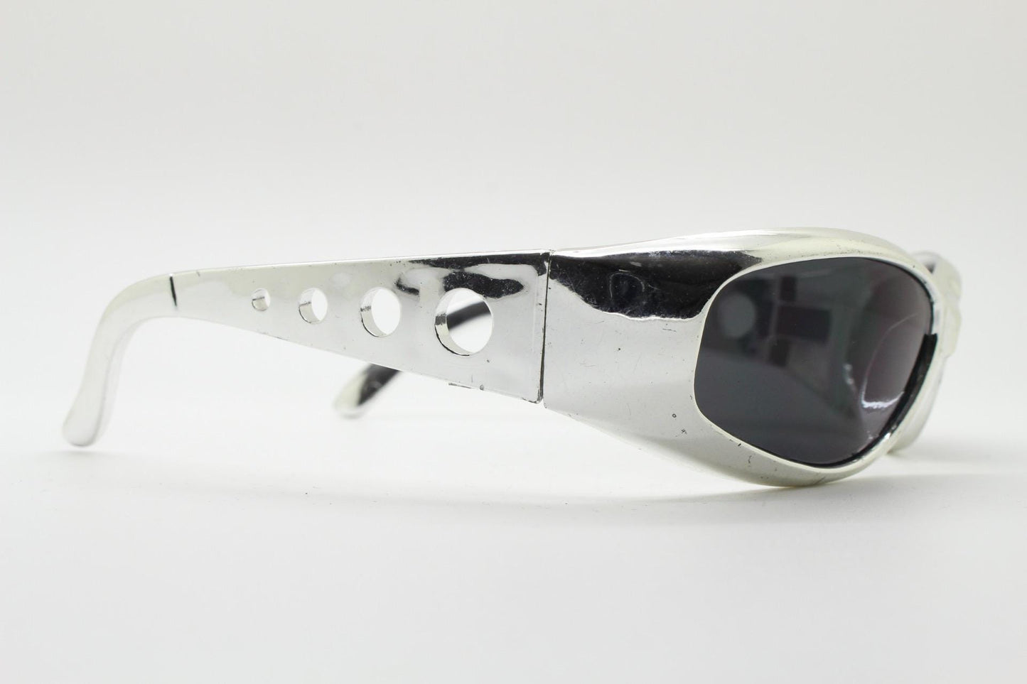 90s vintage visor sunglasses. Hyper real metallic silver superhero style mini mask sport shield with black lenses. Wrap around. NOS cosplay