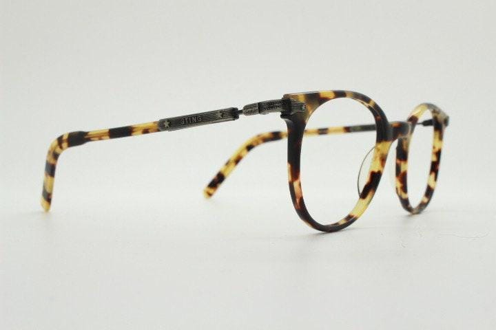 Sting 90s vintage round eye glasses made in Italy. Honey tortoise acetate optical frames. 40s retro design. Prescription eyeglasses. RX
