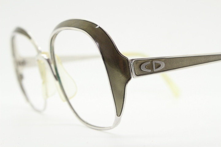 Christian Dior 70s vintage big round eye glasses made in Austria. Silver optical frame with dynamic reflective grey enamel. Prescription RX