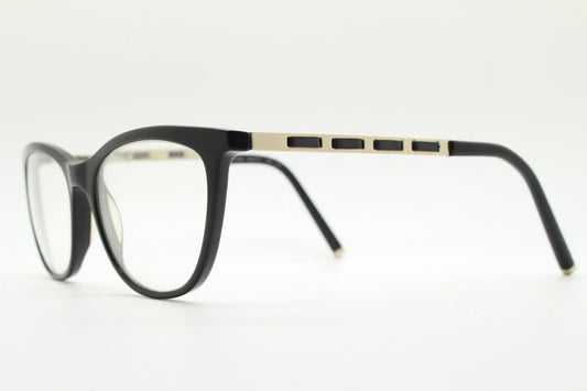 Vintage elegant cat eye glasses by Heritage. Black gloss acetate optical frames with leather lattice arms. Prescription RX cateye spectacles