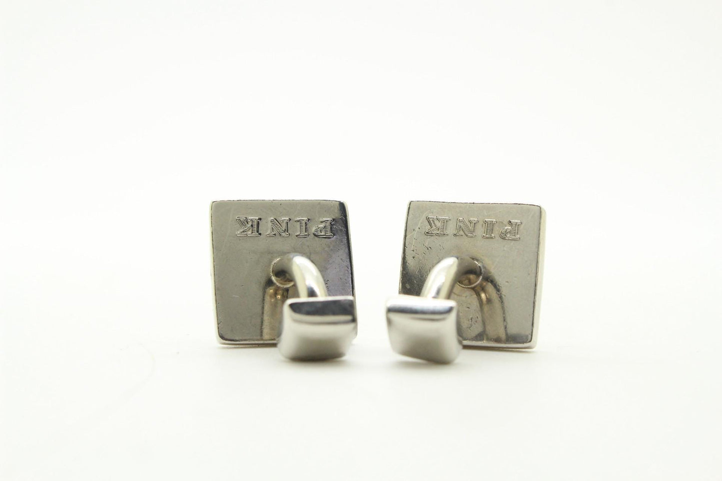 Thomas PInk vintage square cuff links made in England. Solid metal construction with enamel stripes in green and yellow tones. Unused NOS