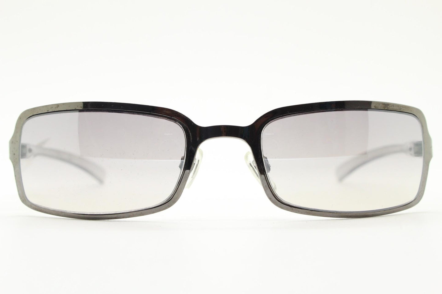 Y2K vintage rectangular sunglasses. Low profile mini shield frame in gunmetal chrome with light tone graduated mirror lens. 2000's. 90s. NOS