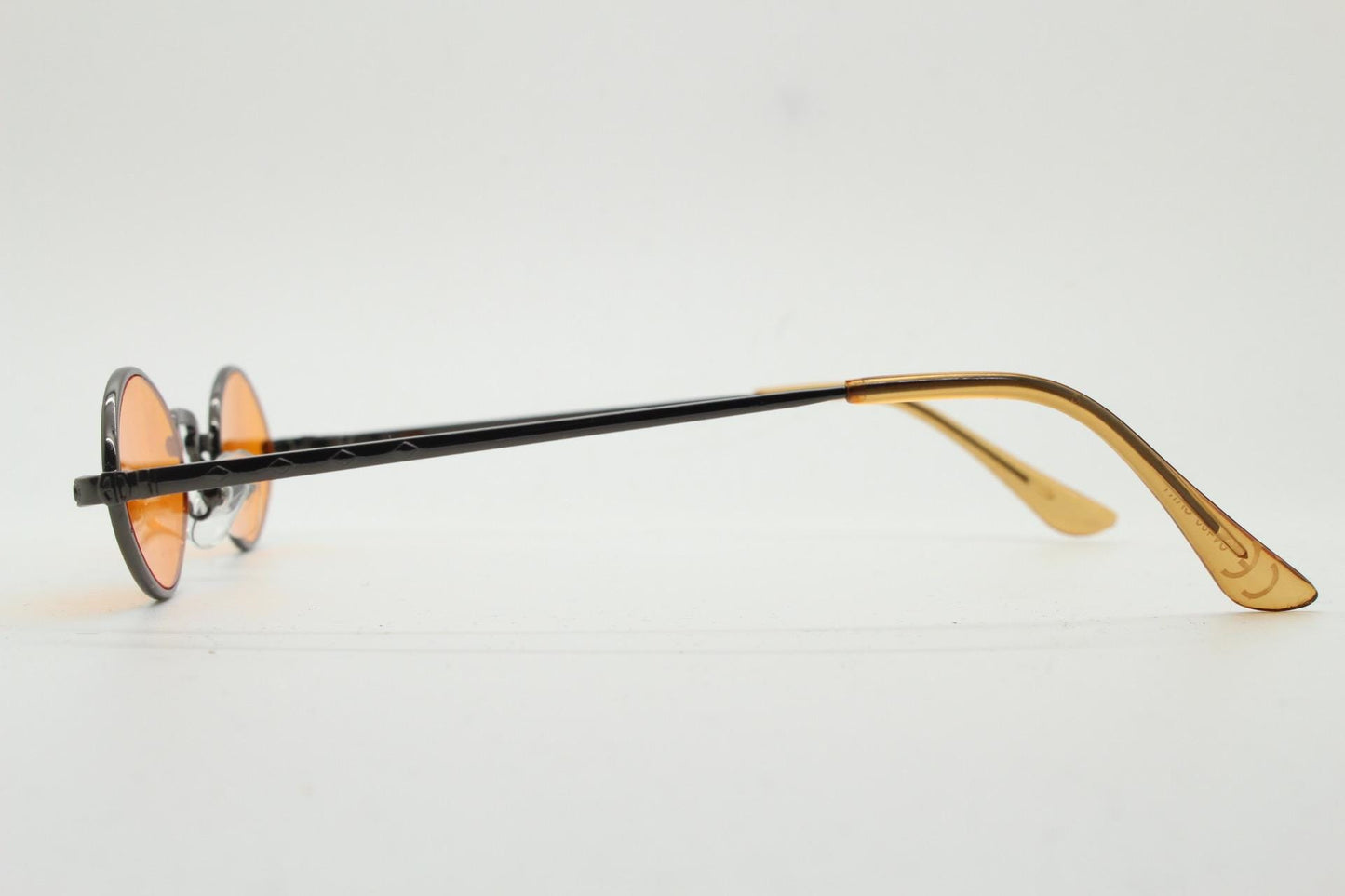90s vintage small oval sunglasses. Imposing minimal rose gold metal victorian style frame with blazing orange lenses. Steampunk. BNWT