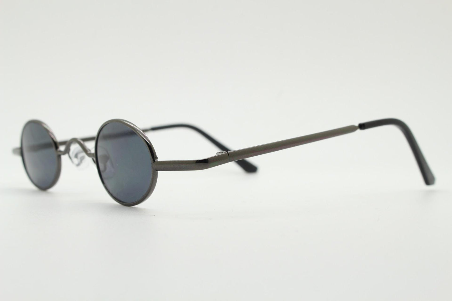 90s vintage small oval sunglasses. Imposing minimal grey gloss metal victorian antique style frame. Steampunk. Unused NOS